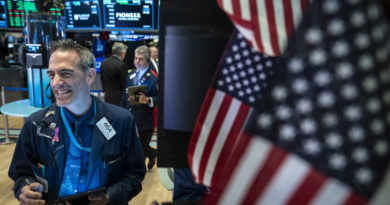 Stocks jump as the S&P 500 ends a wild week almost exactly where it started