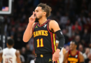 Young dishes career-high 22 assists to stun Cavs