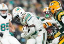 Packers withstand Dolphins' late push to take the Thanksgiving matchup