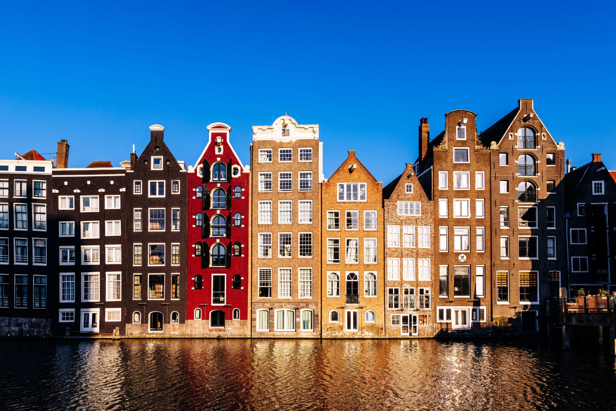 Amsterdam to allow ‘ugly’ solar panels on its world-famous canalside houses, angering locals