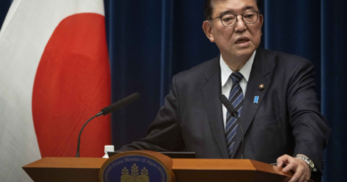 Japan approves its largest budget ever, boosts social welfare and defense spending