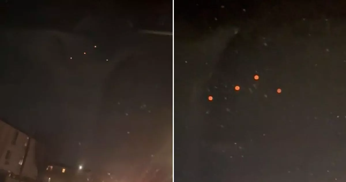 Neon orange ‘UFO orbs' caught flying over JFK 'moving oddly’ before disappearing into the abyss – The Mirror US