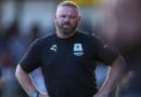 Rooney defiant amid calls for Plymouth sacking