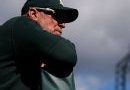 Sources: Big-spending A's extend Rooker for 5 years