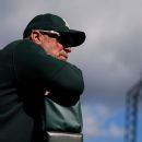 Sources: Big-spending A's extend Rooker for 5 years