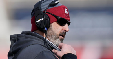 Ex-WSU coach loses suit over vax-related firing